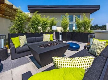Rooftop patio with incredible views, fire-pit, barbecue grills, and lounge seating
